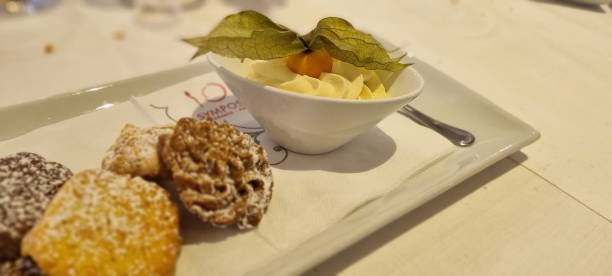 istock Assorted italian pastries and cream on plate 2157463774