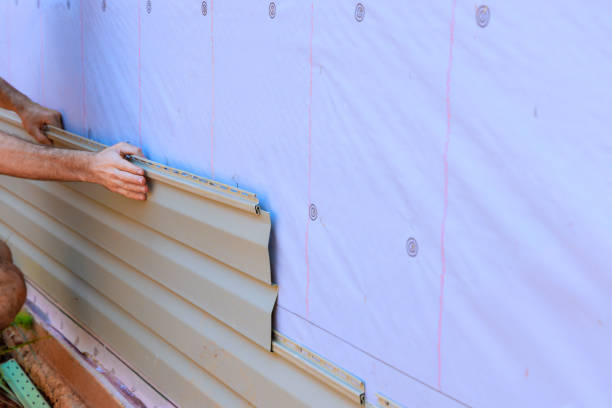 istock An installation process for vinyl PVC siding on new home facade by a handyman 2157464654