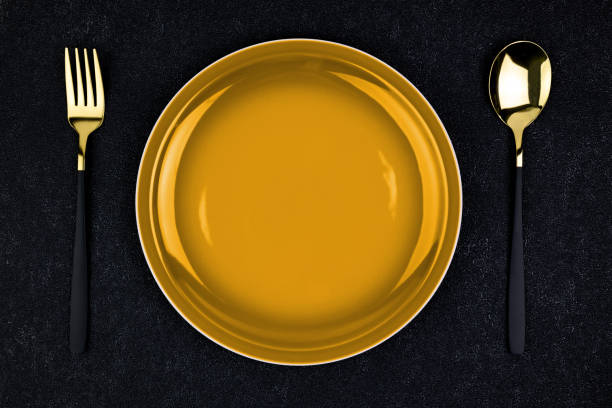 istock Gold tableware for restaurant mockup on concrete black background, top view 2157468448
