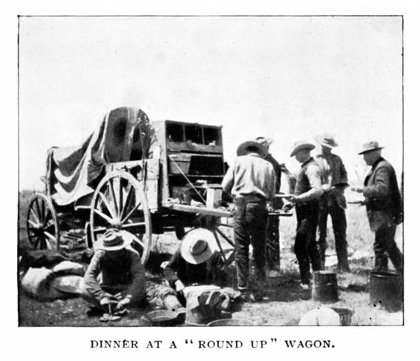 istock Cowboys Eat from Chuckwagon, Vintage Photograph 2157470028