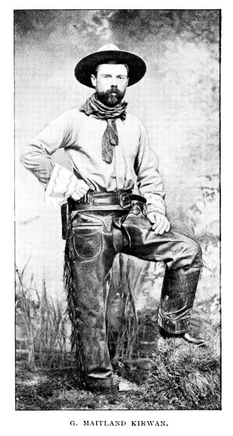 Cowboy Maitland Kirwan on Horse Ranch near Miles, Montana, Vintage Photograph Maitland Kirwan is a cowboy who co-owns a horse ranch near Miles, Montana. Photograph engraving published 1893. Original edition is from my own archives. Copyright has expired and is in Public Domain. cowboy mustache pictures stock illustrations