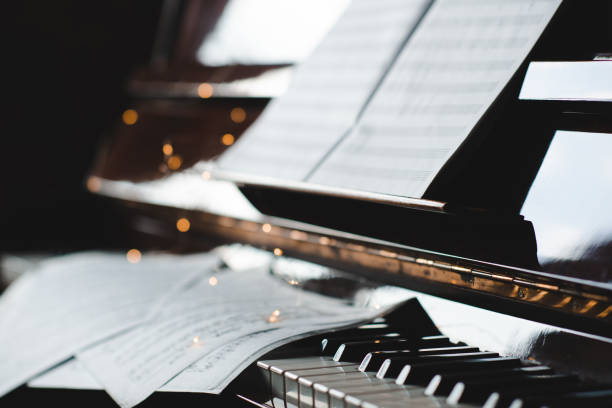 istock Piano keys with musical notes close up 2157470631