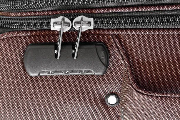 istock combination lock on travel bag, background 2157471819