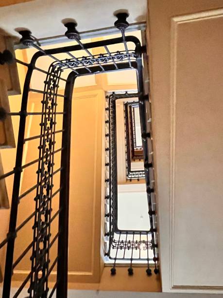 istock upward view of an old staircase 2157471841