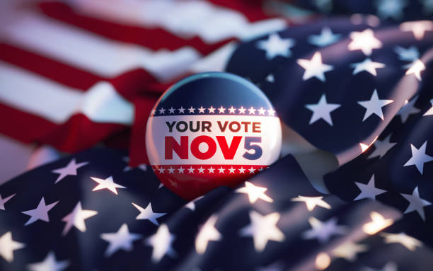istock Your Vote November 5 Printed Badge On Over American Flag 2157472104