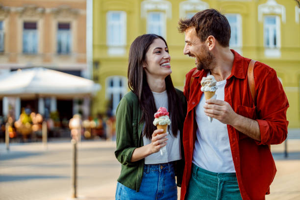 istock Couple enjoying ice cream on sunny day 2157475212