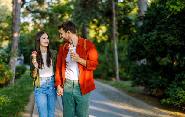 istock Couple enjoying ice cream during sunny day 2157475299
