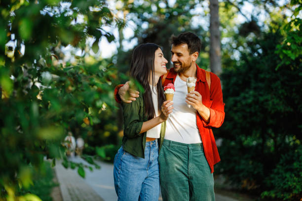istock Loving couple enjoys ice cream and embraces 2157475362