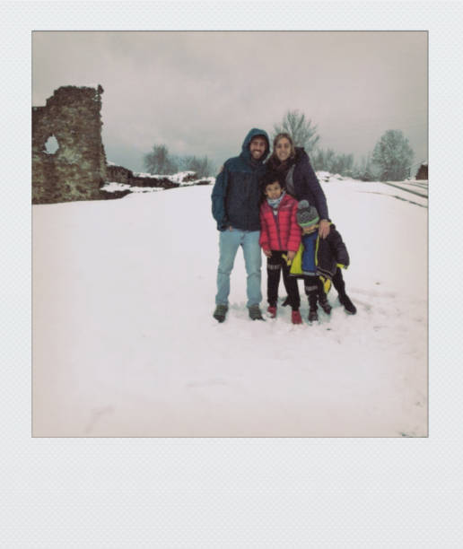 istock Family in the snow 2157475371