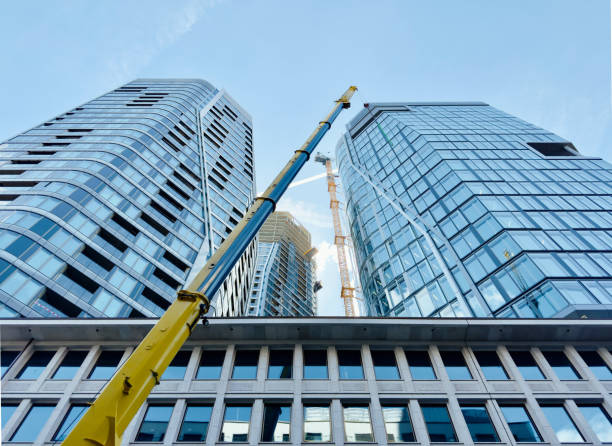 istock looking up at a skyscrapers in the financial district 2157475927