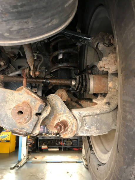 istock car bottom, wheel, shock absorbers, parts 2157481556