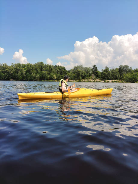 istock A young guy is kayaking on the river. Sports and an active lifestyle 2157486109