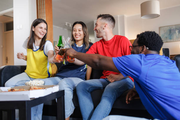 istock Soccer fans toasting with beer 2157486454