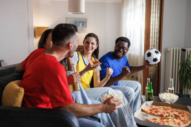 istock Happy friends cheering - It's a goal! 2157486492