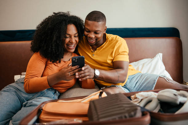 istock Couple packing for vacation trip 2157490126