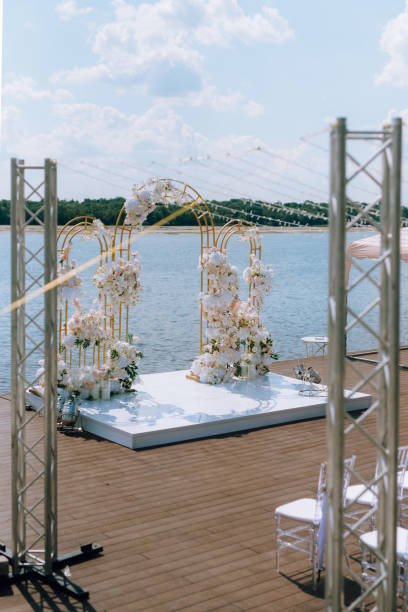 istock wedding ceremony area, arch chairs decor 2157490312