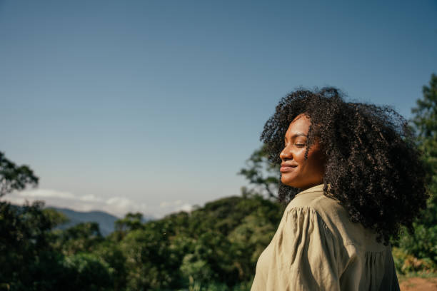 Black woman contemplating the view on a trip