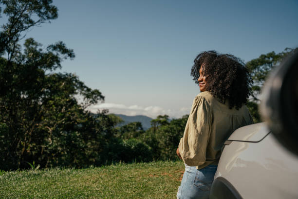 istock Black woman contemplating the view on a trip 2157491800