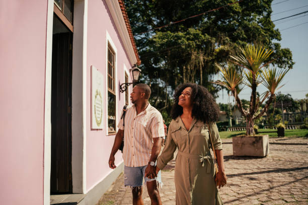 istock Couple strolling through the tourist town 2157491992