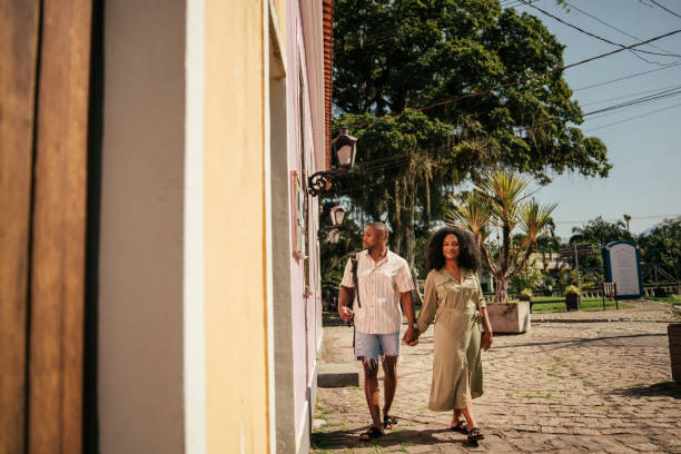istock Couple strolling through the tourist town 2157492006