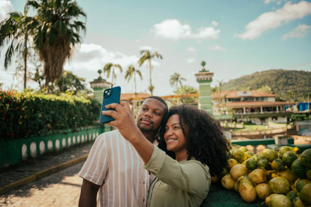 istock Couple taking selfie in tourist town 2157492278