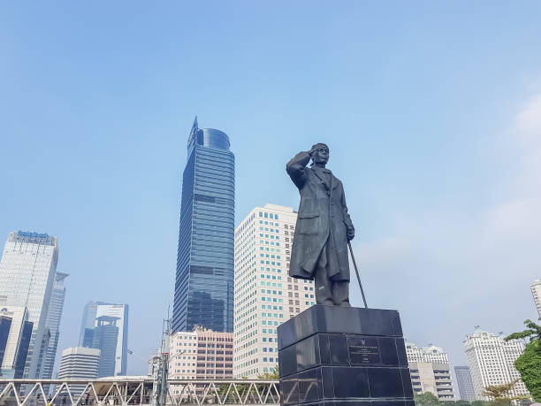 Jakarta, Indonesia - June 9, 2024 : The statue of General Sudirman (Patung Jenderal Sudirman) on Sudirman road. Sudirman was the first commander of the Indonesian National Armed Forces