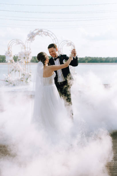 istock the first dance of the bride and groom inside a restaurant 2157493351