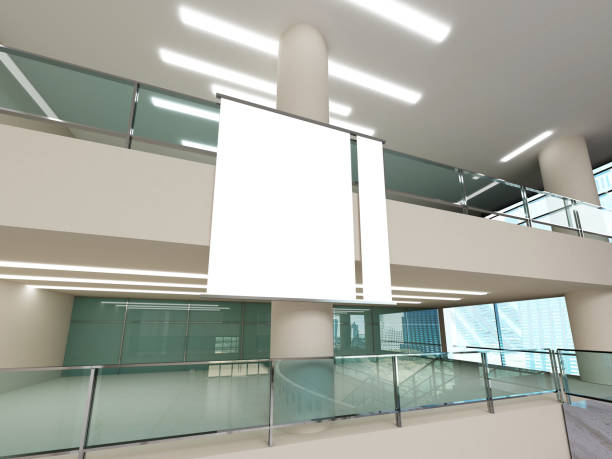 istock A blank white advertising banner hanging from balcony railings in a modern building interior with glass terrace balustrade with steel. 3d rendering illustration 2157499037