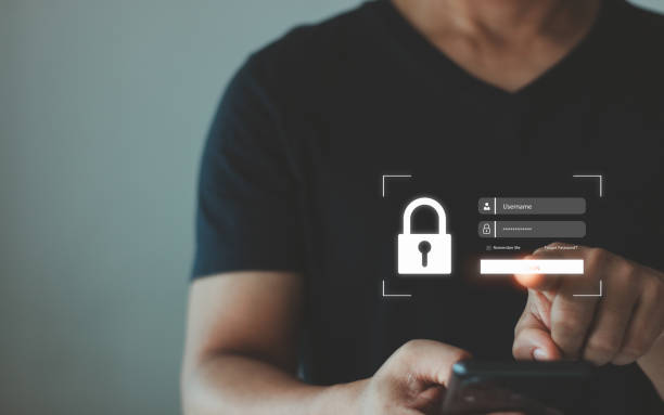 istock User presses login and password on smartphone virtual screen. Cyber security, information security and encryption, secure access to user's personal information, secure Internet access, cybersecurity. 2157500101
