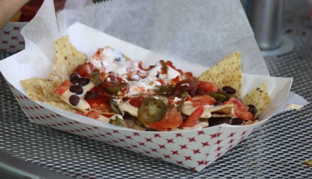 istock Nachos In a Take-Out Food Tray 2157500917
