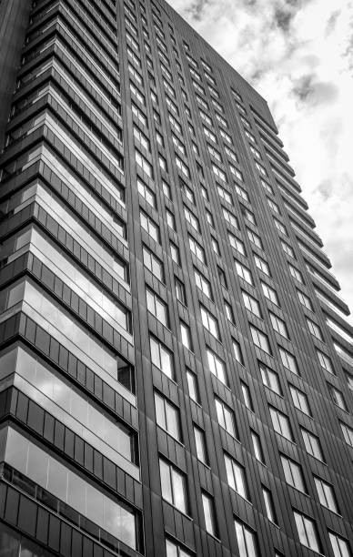istock Low angle view of a modern building in black and white 2157501602