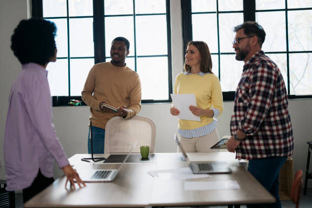 istock Diverse business people having a brainstorming session at conference table in startup 2157502598