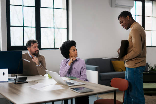 istock Multiracial business team having planning meeting at startup 2157502981