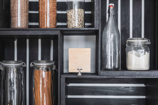 istock Dry grains in containers on a shelf 2157508922