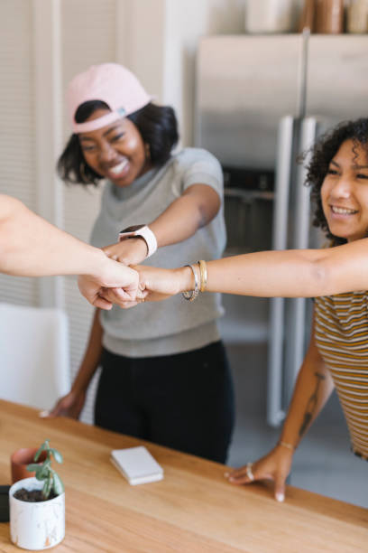istock Colleagues doing a fist bump in the office 2157514705
