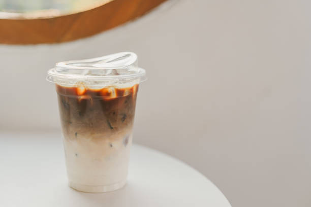 istock Iced latte coffee, placed on a table in a cafe. 2157517936