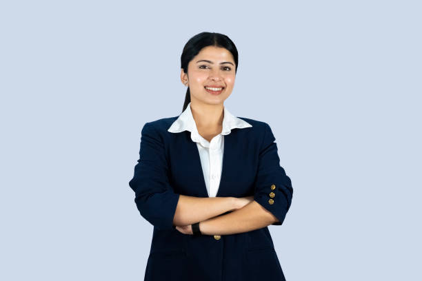 istock Asian office worker with a notepad diary and mobile phone working in an office professionally 2157518832