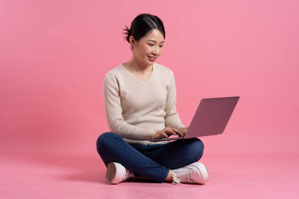 istock Image of beautiful Asian woman posing on a white background 2157520769