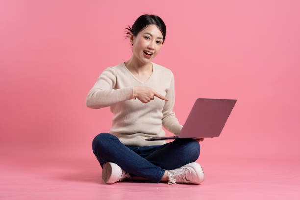 istock Image of beautiful Asian woman posing on a white background 2157520819