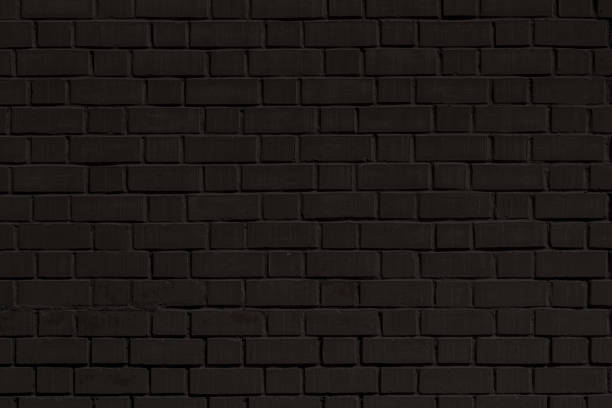Texture of a black brick wall.