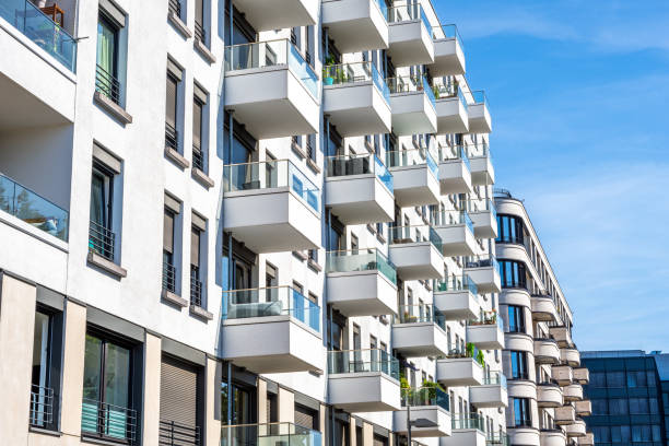 istock Facades of white modern apartment buildings 2157522154