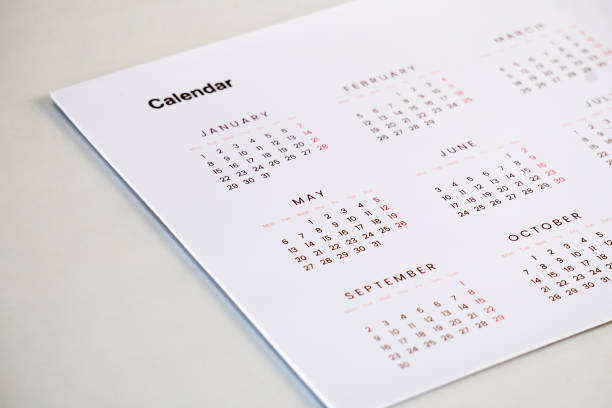 istock sheet of calendar on table 2157522987