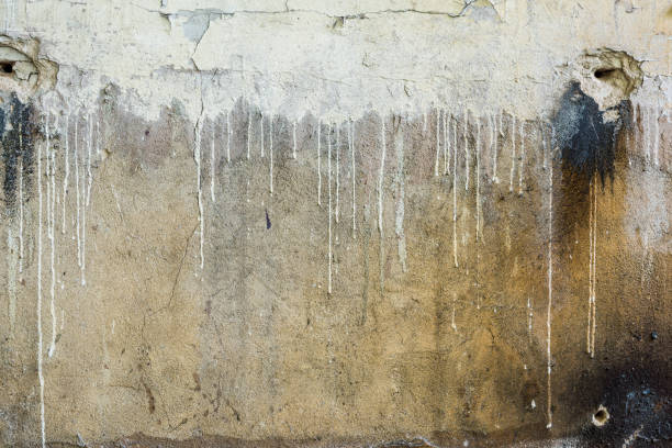 istock Texture Of Dirty Broken Wall With Paint Leaks 2157524749