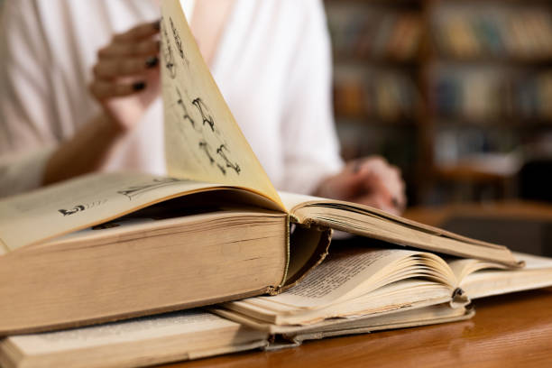 istock girl student in the library 2157527406