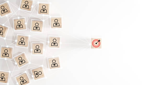 istock Red dartboard and black arrow connection linkage with human icon for customer focus target group and customer relation management concept. 2157529247