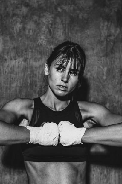 istock Female boxer at the gym 2157529865