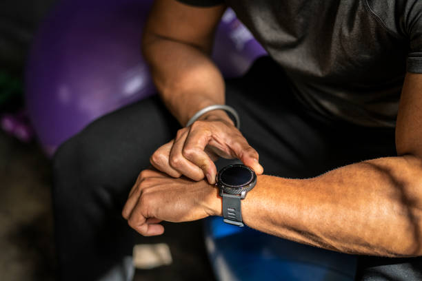 istock Athlete wearing a smartwatch in the gym 2157529986