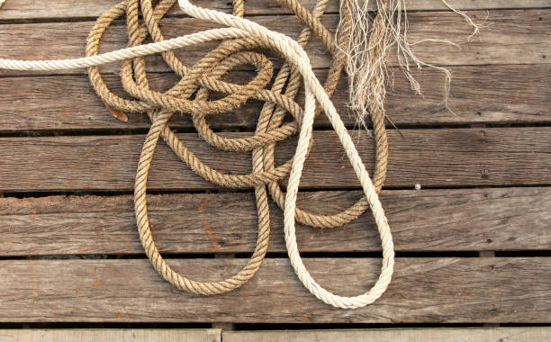 istock Rope on a wooden background 2157531173