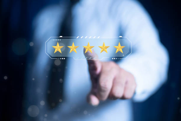 istock Businessman touch on five-star icon for feedback review satisfaction service, Customer service experience and business satisfaction survey. 2157532337