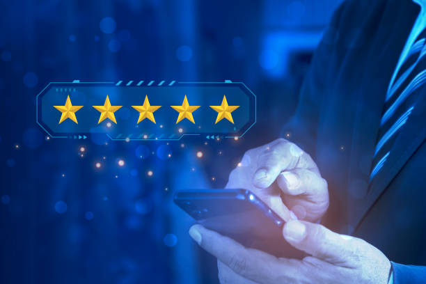 istock Businessman touch on five-star icon for feedback review satisfaction service, Customer service experience and business satisfaction survey. 2157532339